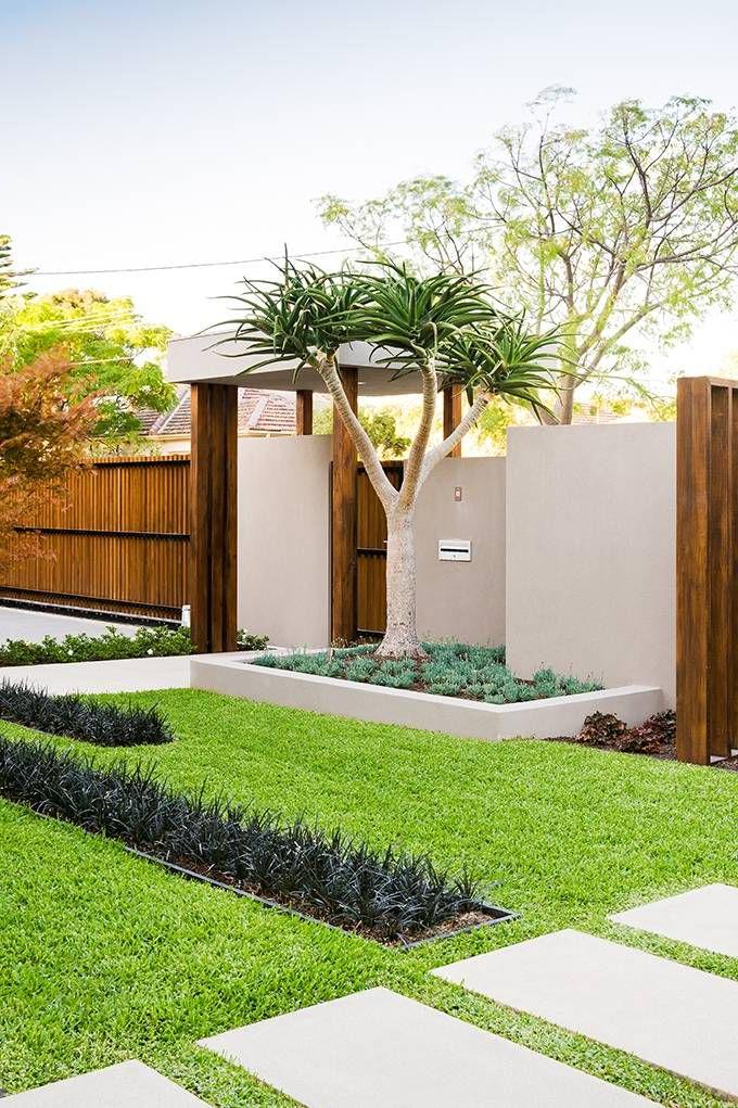 Modern Front Lawn With Wood Fencing