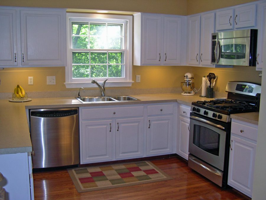 white painted oak kitchen cabinet remodeling idea