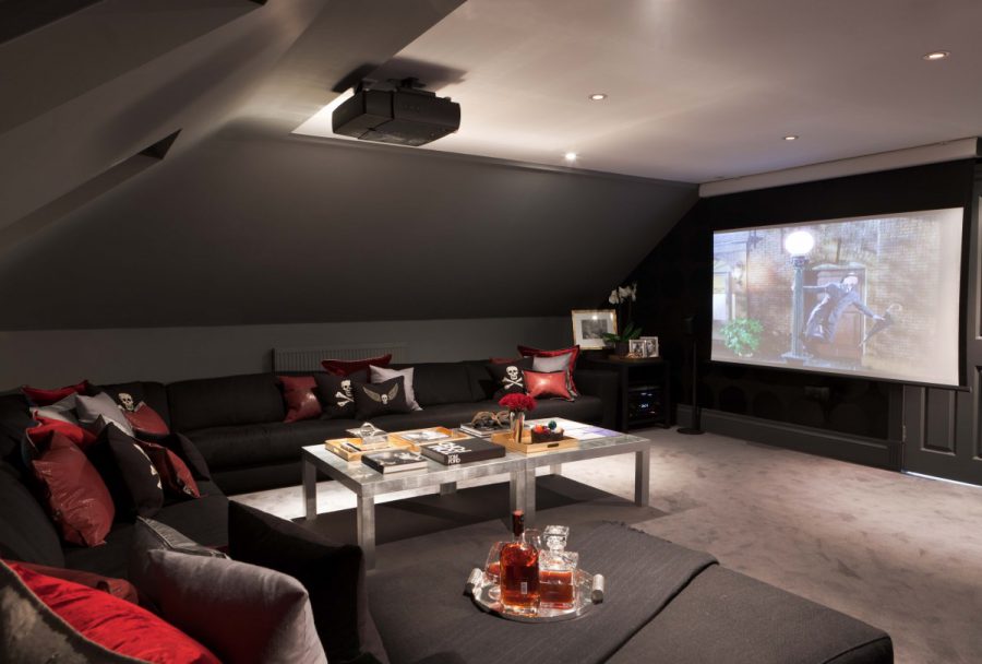 home theater with dark brown l shaped couch