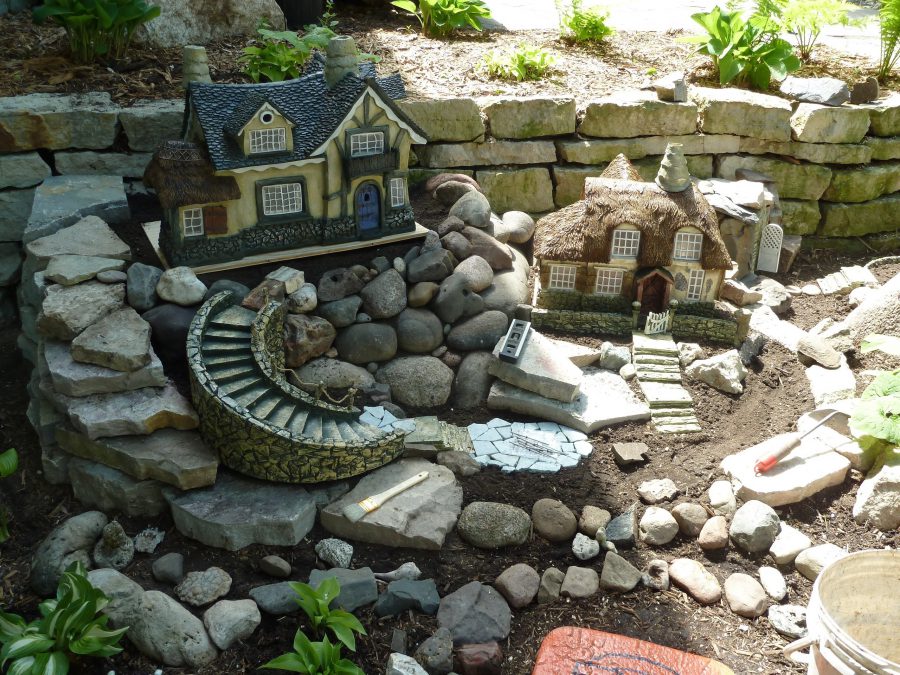 miniature houses with coral stones