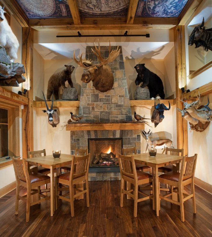rustic-man-cave-dining-room-with-stone-fireplace