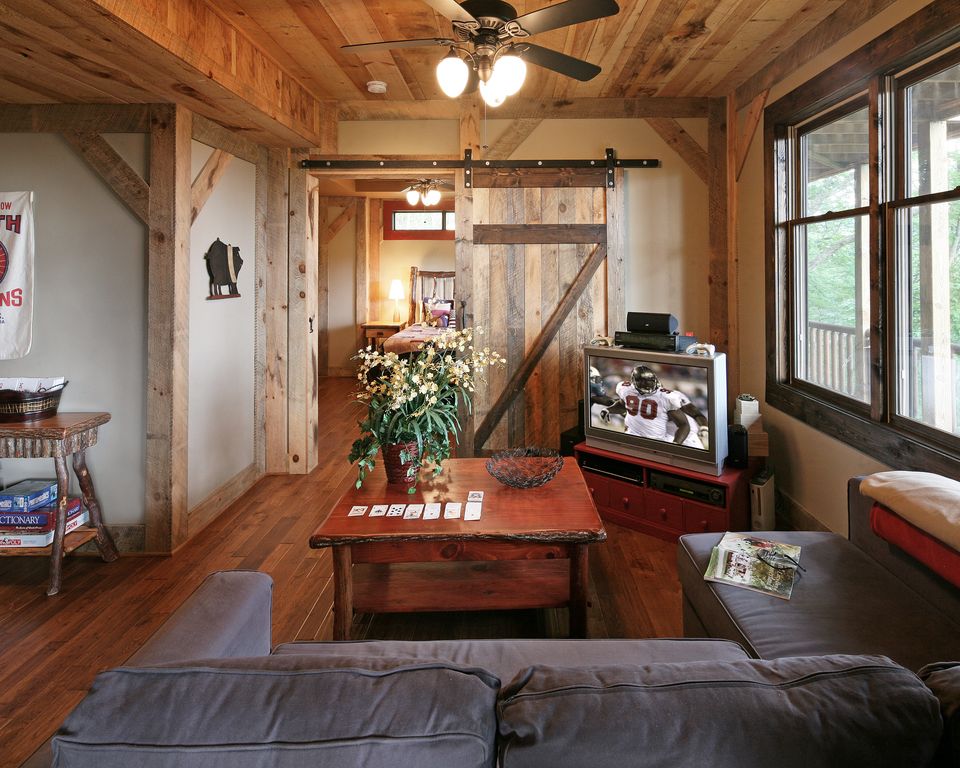 rustic-man-cave-with-sliding-barn-door