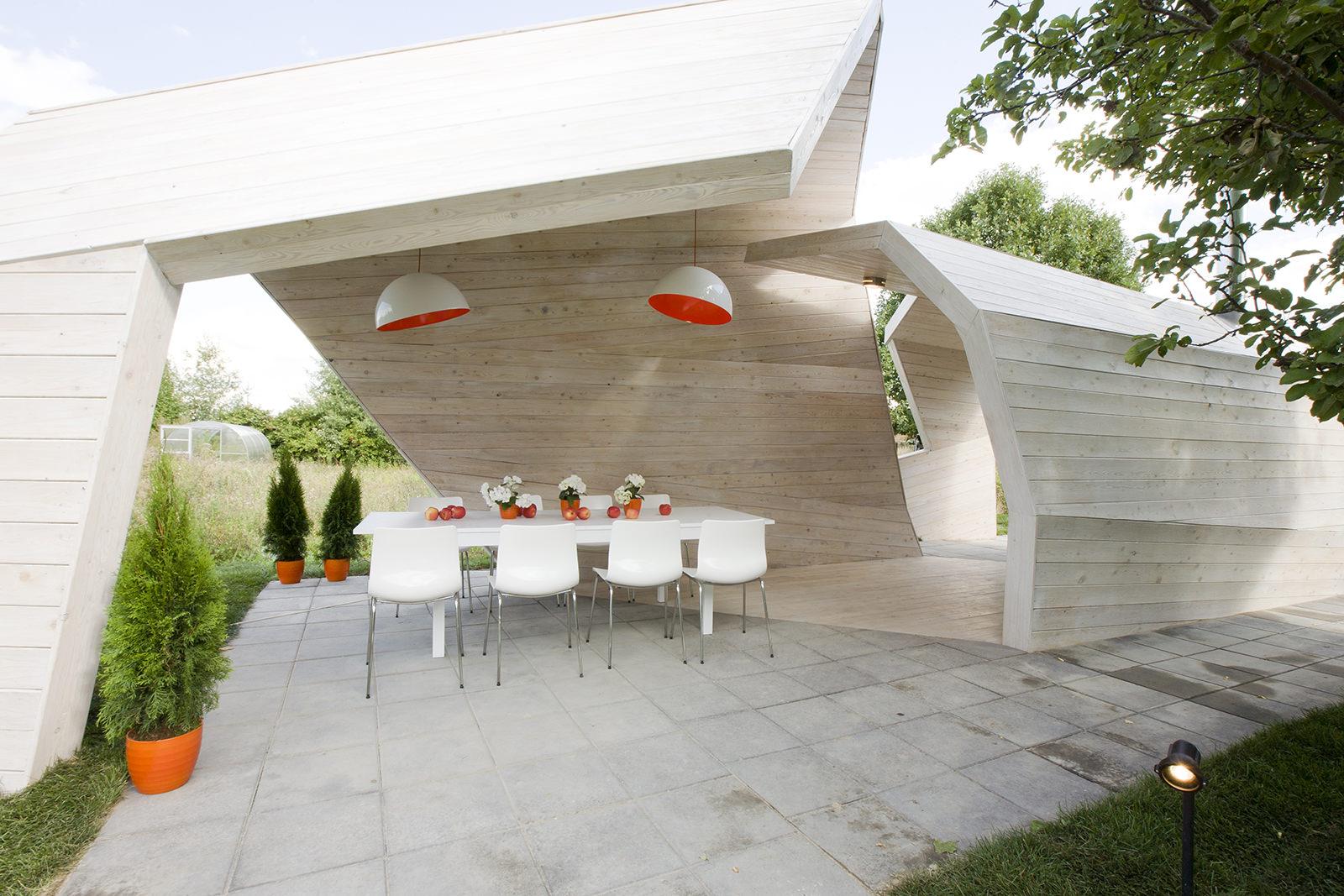 A stylish white gazebo made of wood