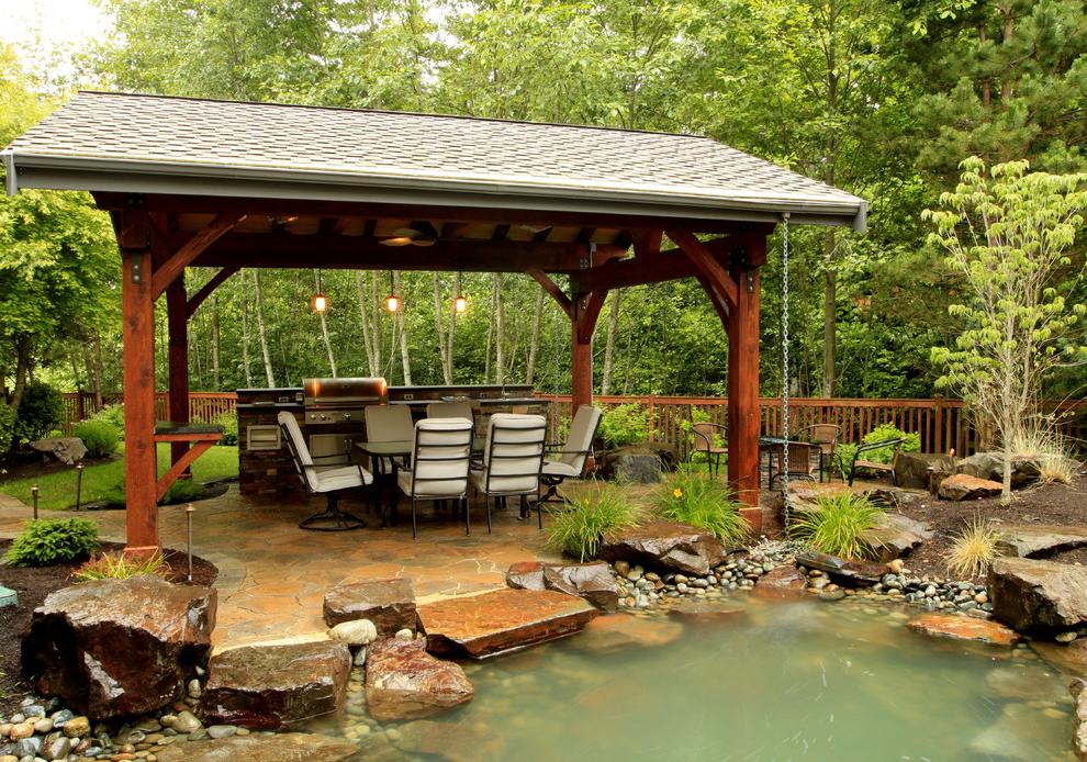 Stone floor and beautiful view of a decorative pond