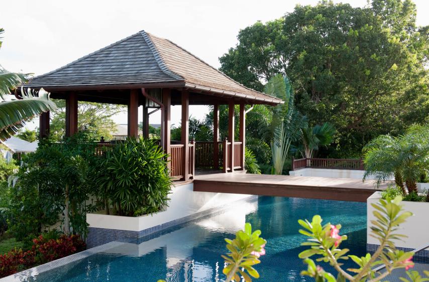 Wooden gazebo, located near the pool