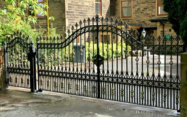 Beautiful forged gates with wicket