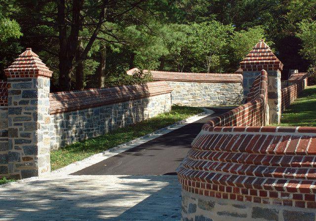 Fence made of brick and stone