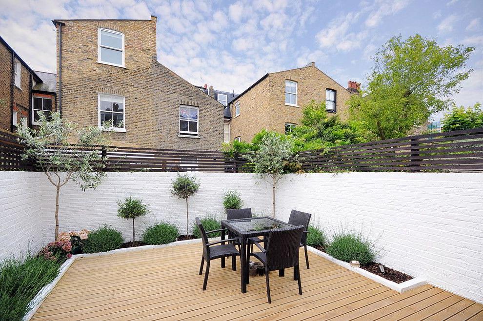 Painted white, the brick fence looks stylish