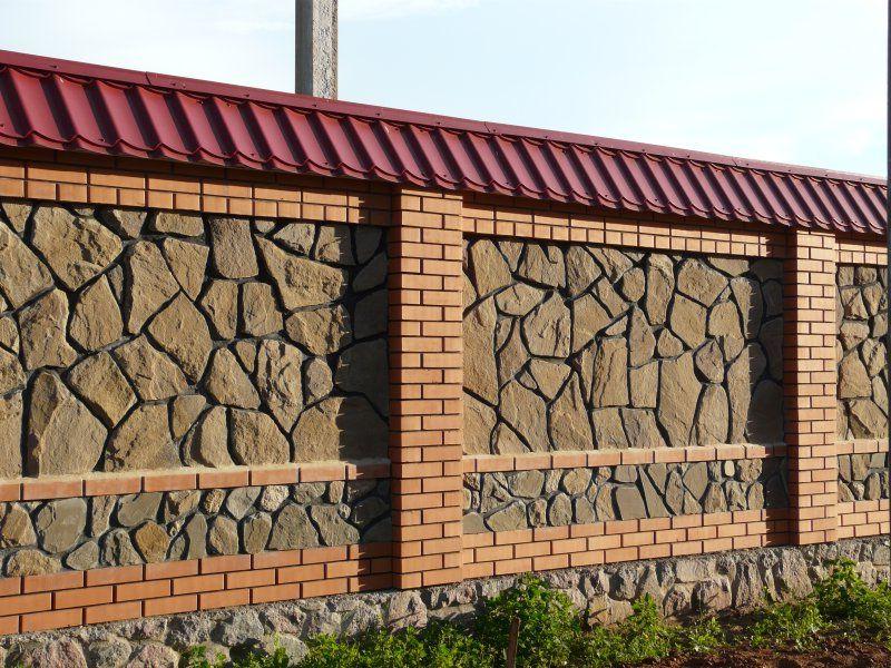 combination of brick and stone in the fence looks very nice