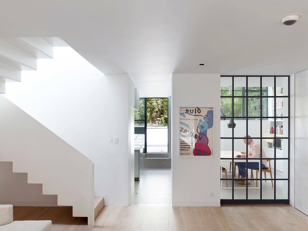 Built In Glass Wardrobes With White Staircase