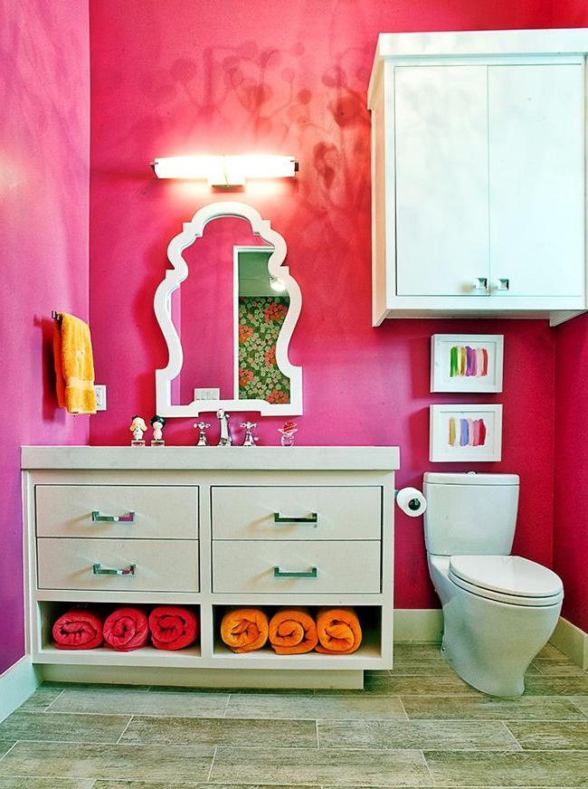 bathroom storage cabinet with colorful wall