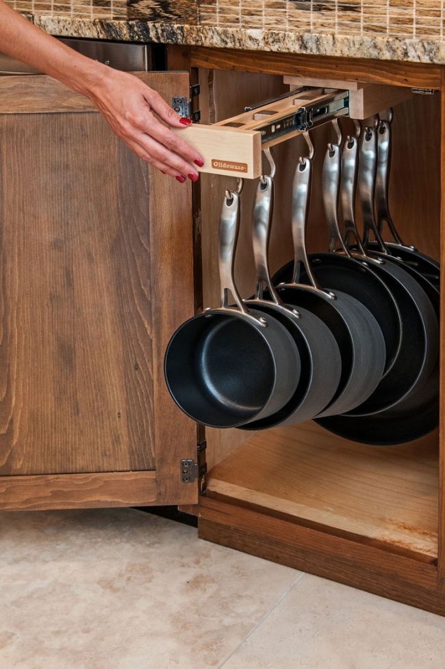 compact storage for pans and pots.