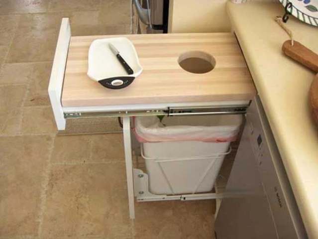 pull out cutting board will save space and scraps will be in trash at once