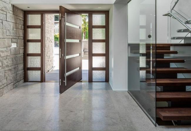 Metal doors with solid wood trim