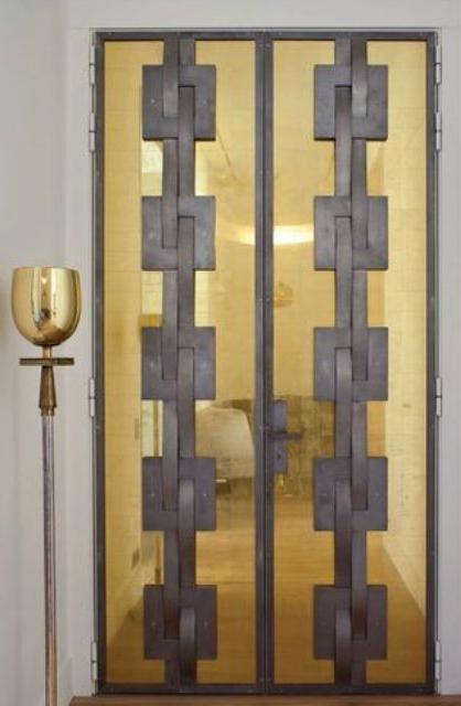 brass and grey modern front doors