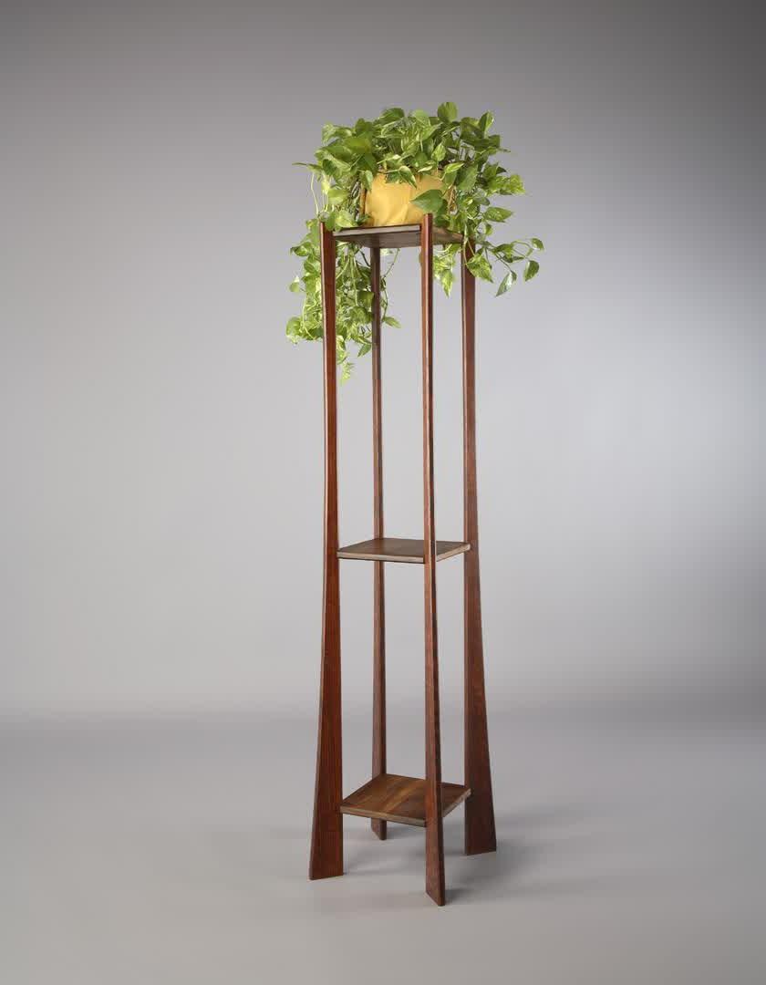 Modern wood plant stand with additional shelving units at base