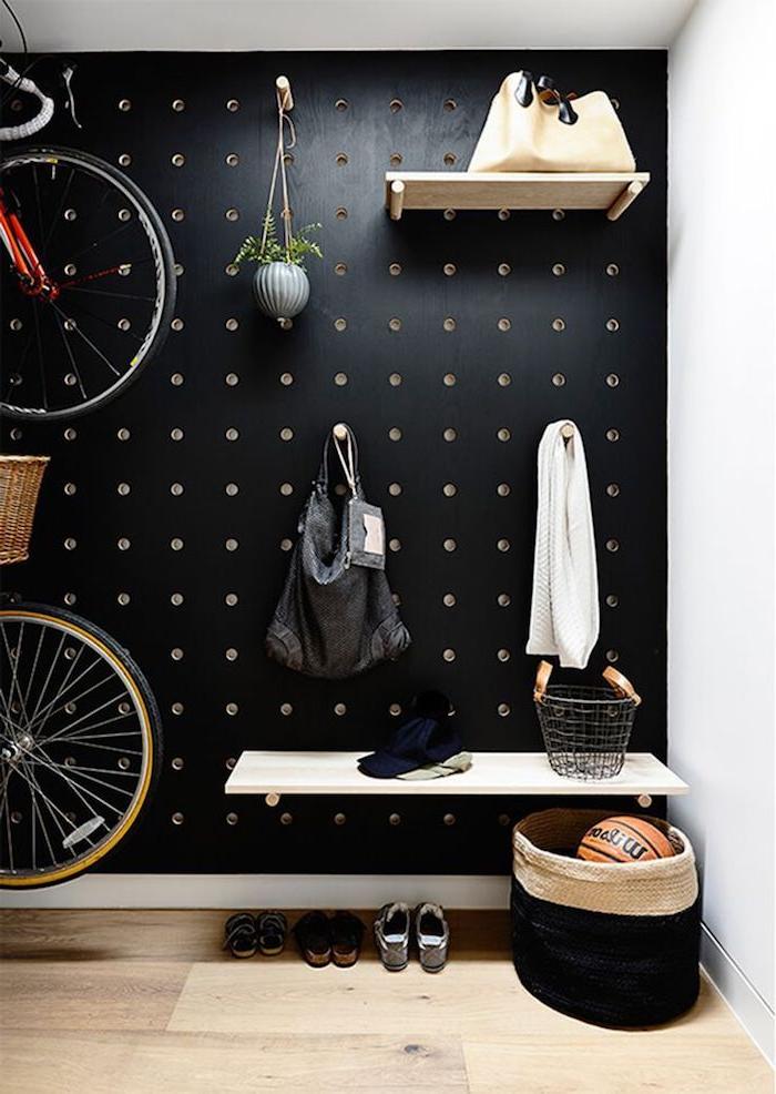 Functional perforated rack in the wall in the hallway