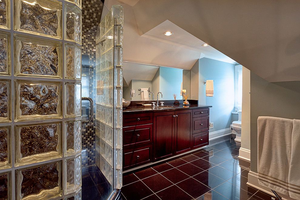 decorated with elegant partitions and a glass door.