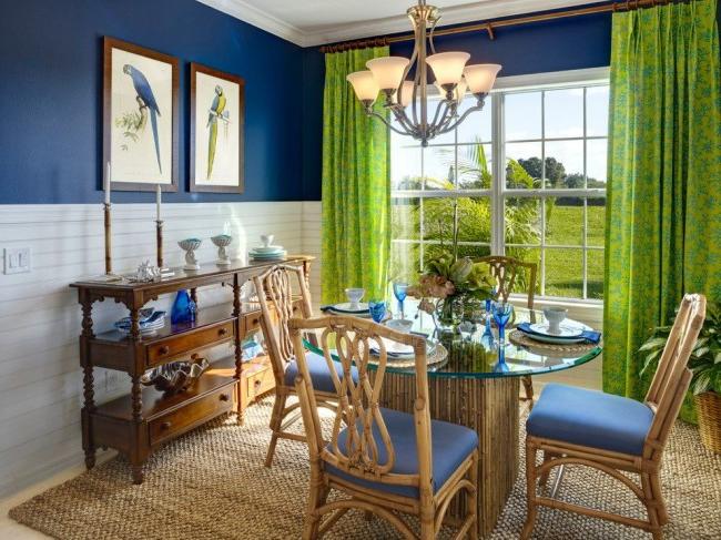 Bright dining room in tropical style with central lighting