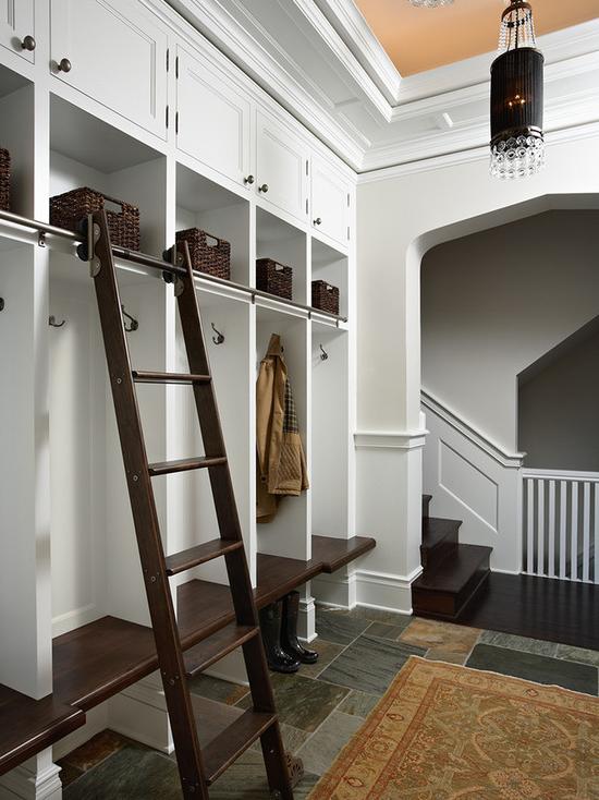 wardrobe with ladder for getting things from the upper mezzanine