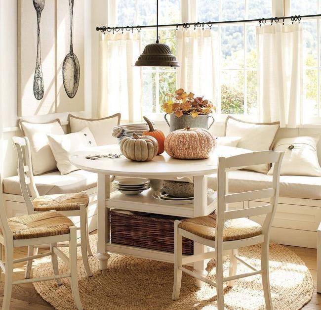 Dining table with shelves for things and a seating area in the kitchen