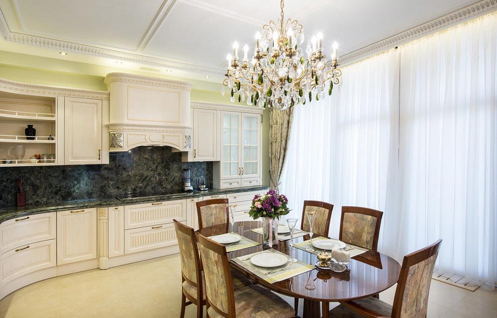 luxurious glass chandelier above the table.