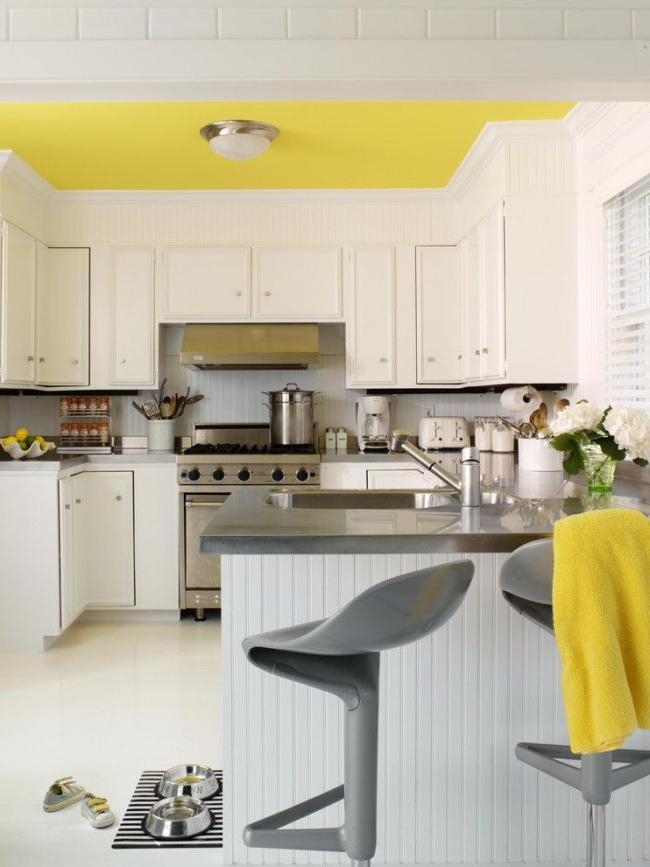 Lemon ceiling - a bright note in the interior of the kitchen