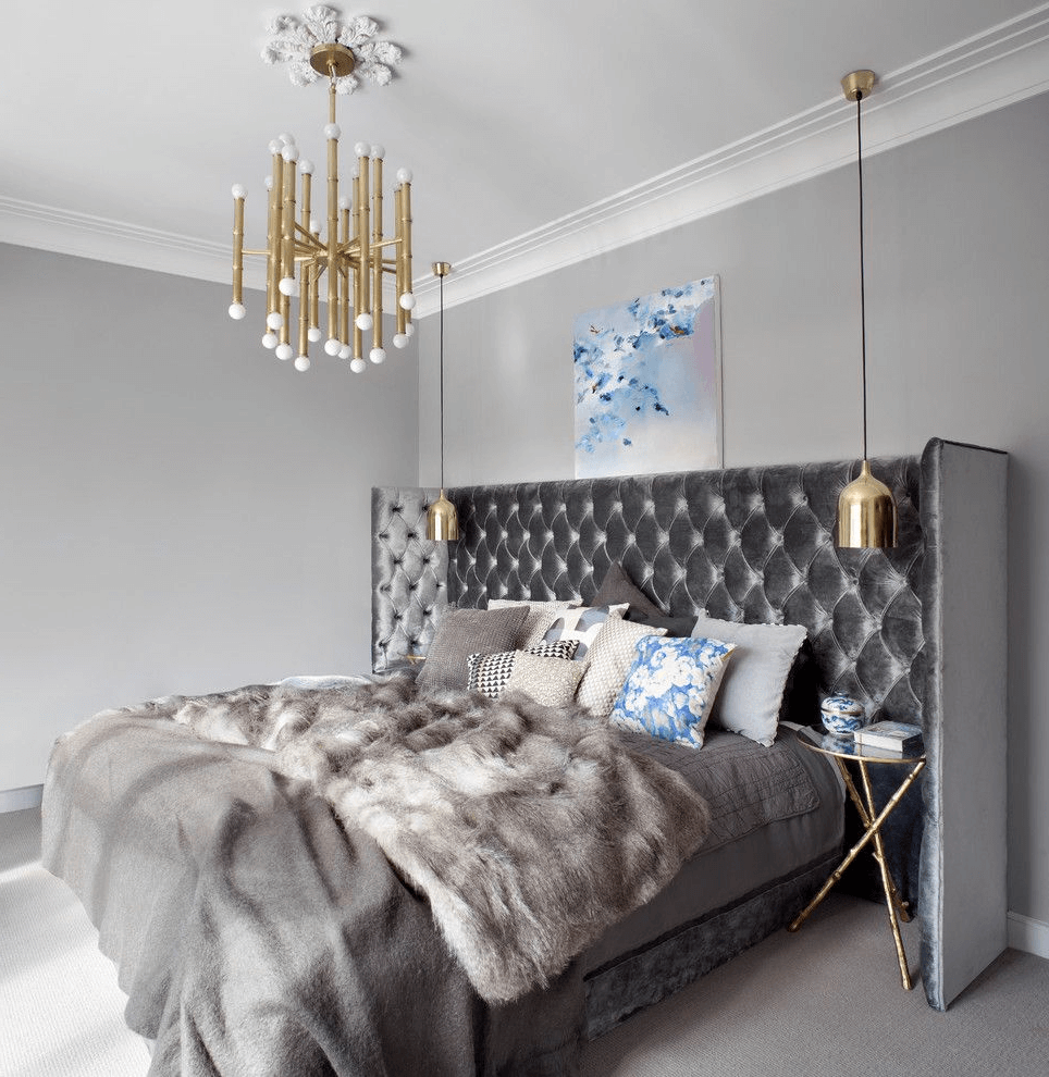 Stylish bedroom in gray colors with bedside ceiling lights