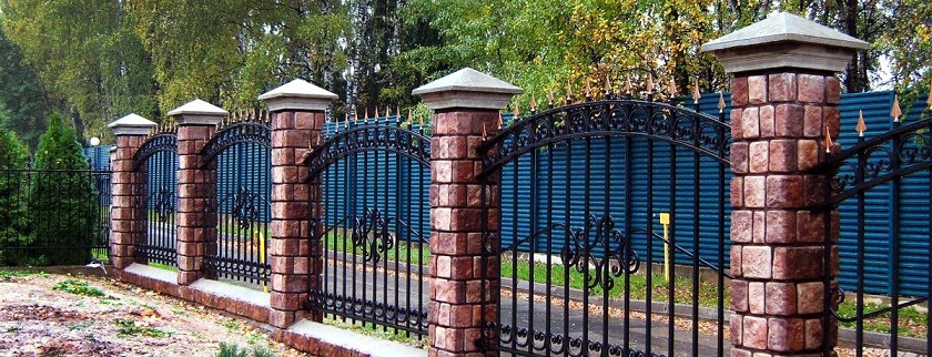 brick supports and forged rods create a pretty solid protective fence