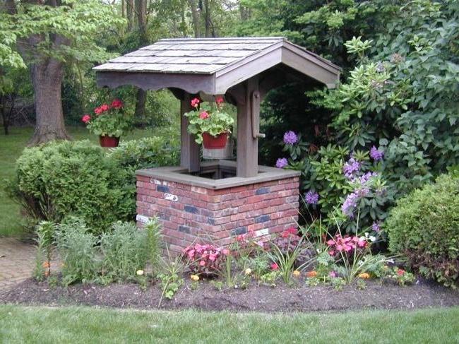 Beautiful house for the well, decorated with flowers