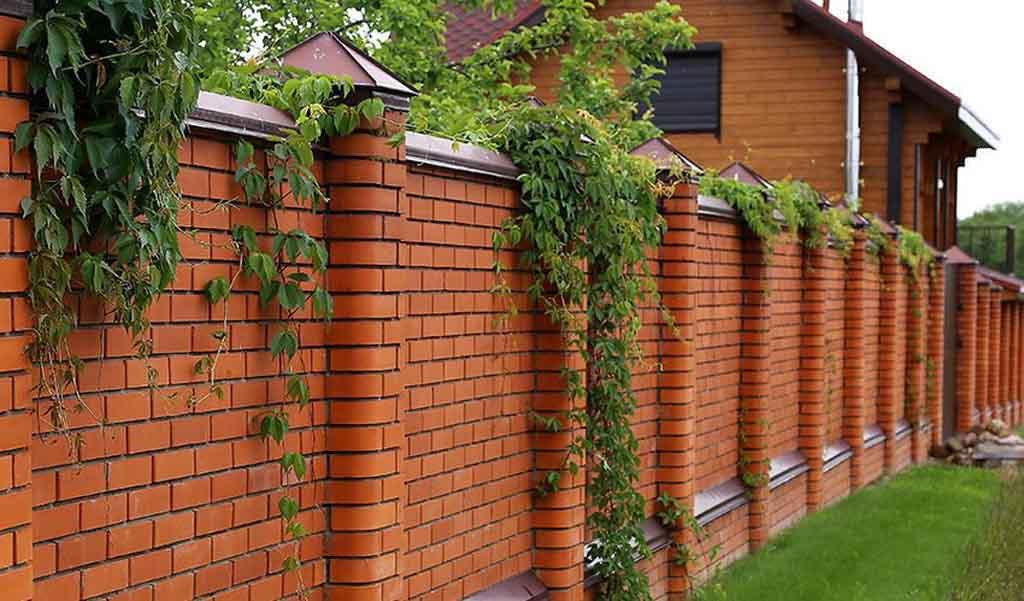 Neat and modern red brick fence