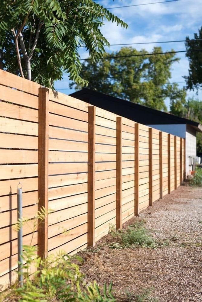 Practical fence made of wooden battens