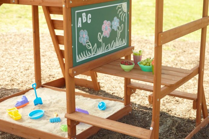 Rectangular sandbox with painting board lid inside