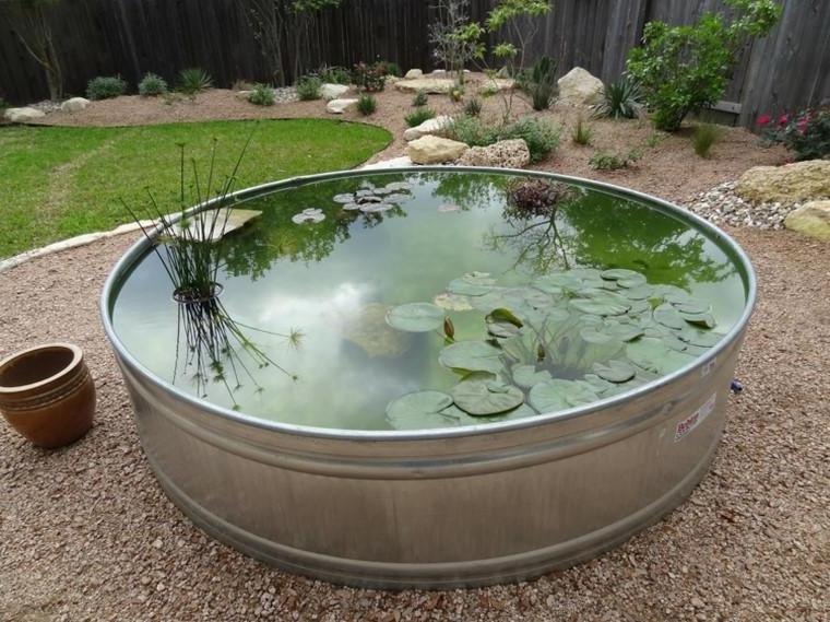 Round shaped steel pond in the garden