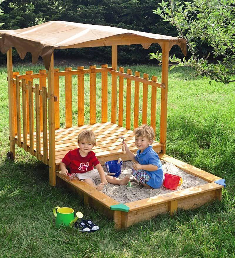 Sandbox with a mobile cover- house