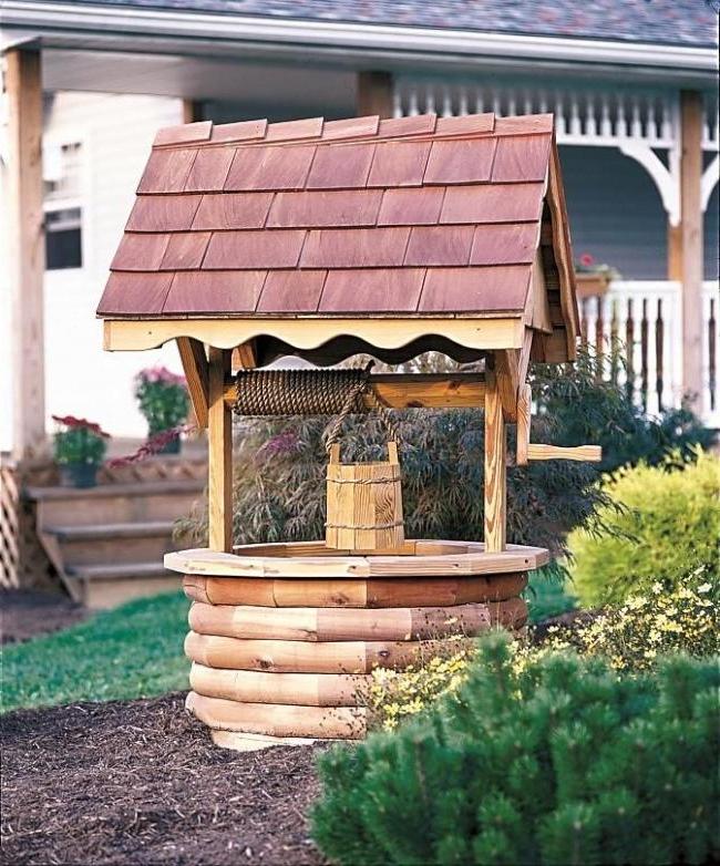 Wooden hut for the well