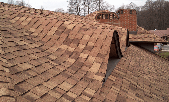 Shingles in the shape of an old shingle roof