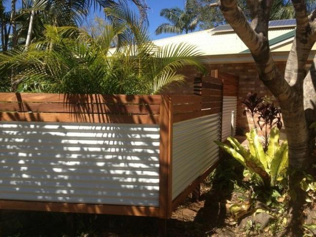 Beautiful fence with a horizontal profiled sheet