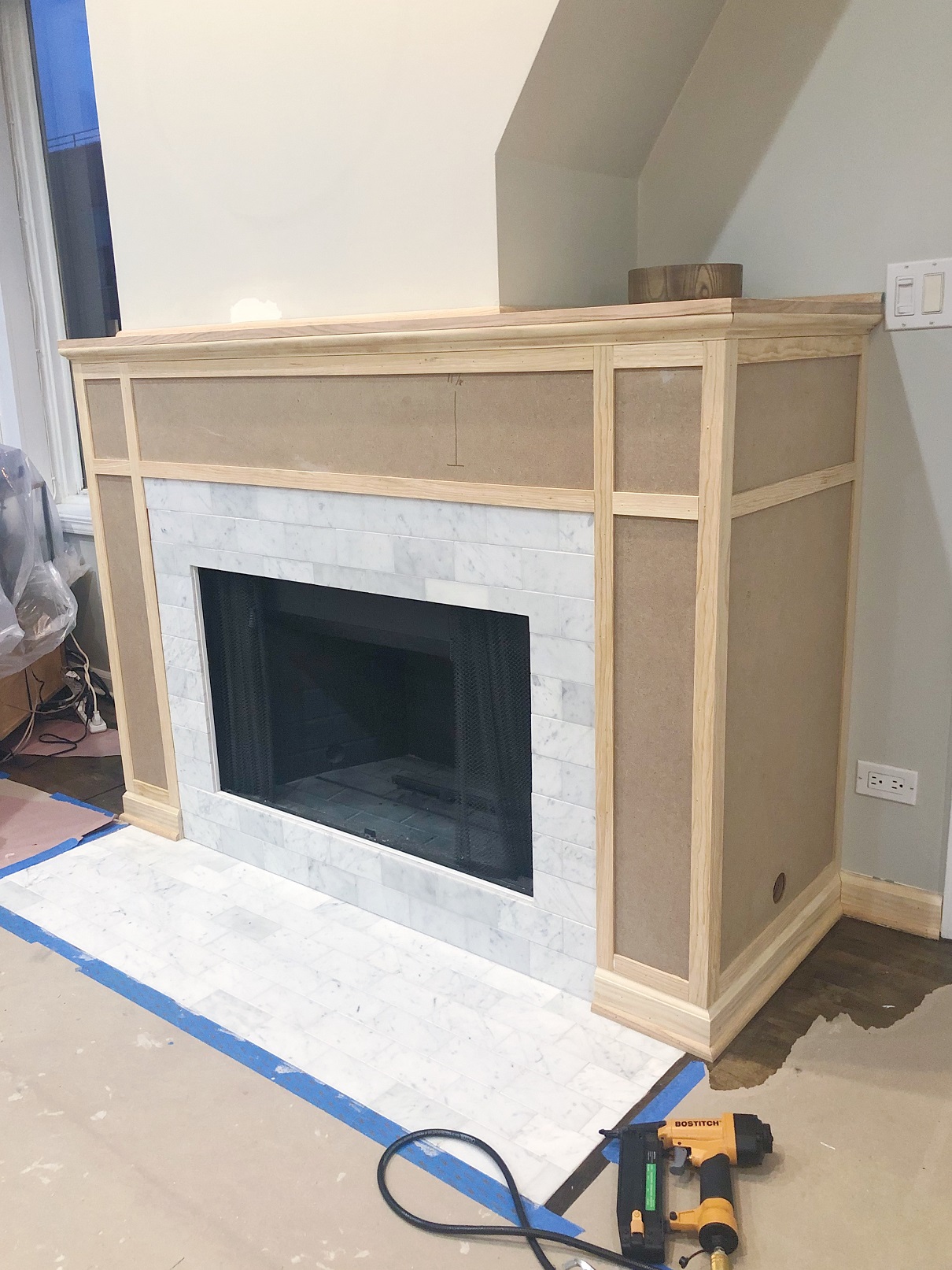 Installing an MDF Mantel Around Marble Fireplace