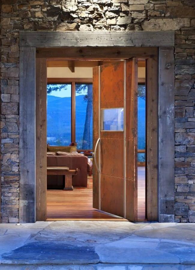 Interesting model of a steel door in rustic style