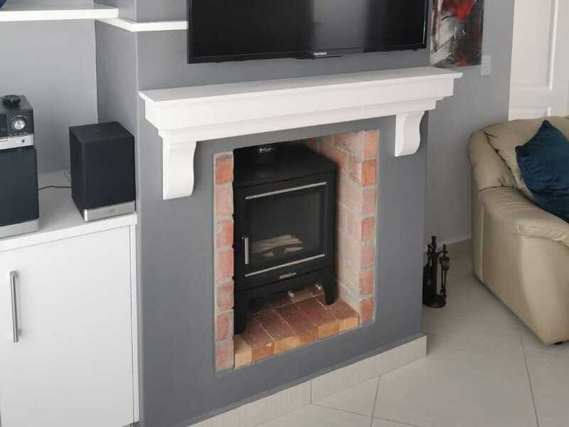 Wall Mounted Timber Mantel Over Brick Recess