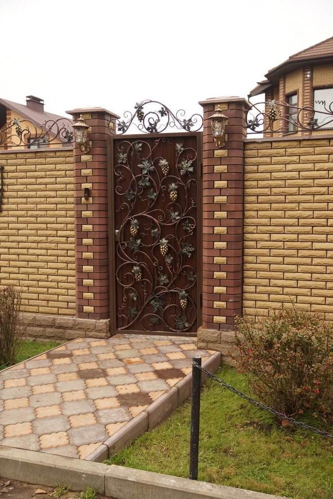 massive oak doors with steel openwork and a glass insert.