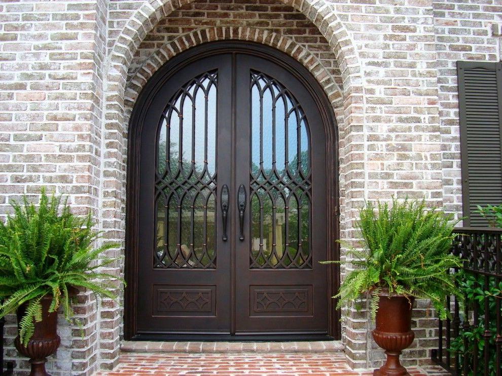 wrought iron and glass front doors