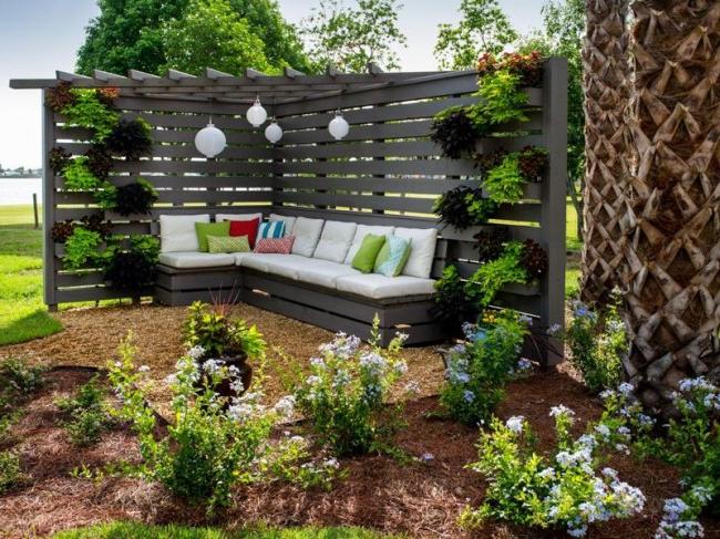 Cozy pergola with a sofa