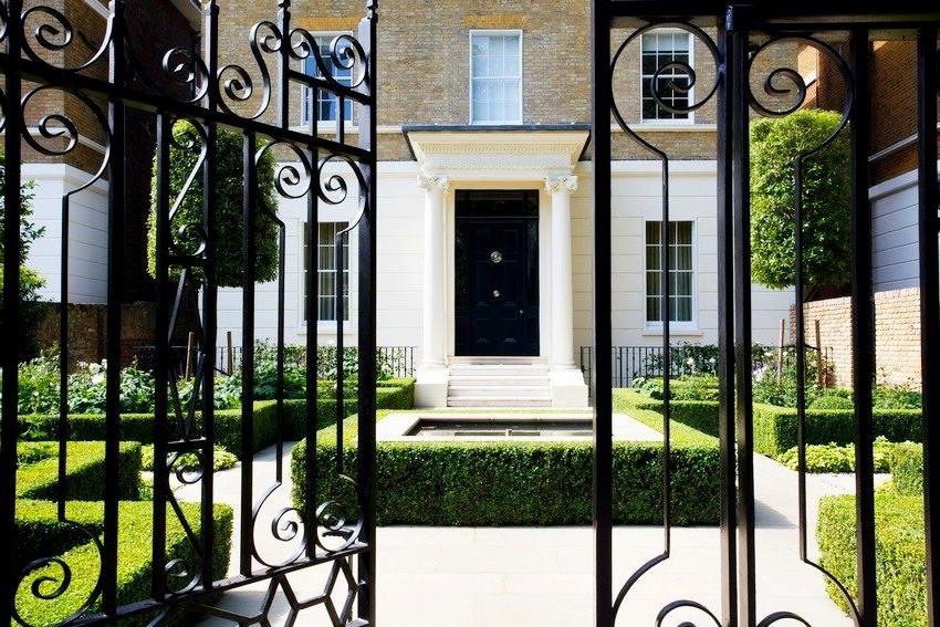 Doors with a built-in wicket, forged from metal