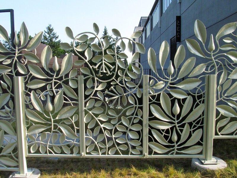 Forged fence with a floral pattern