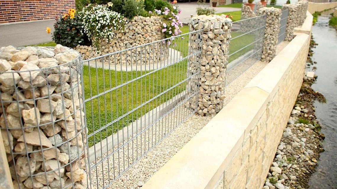 Beautiful decorative fence in a light tone